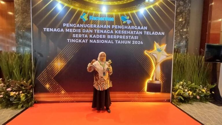 Ainan Musa Peraih Penghargaan Nasional Sebagai Kader Kesehatan Posyandu Berprestasi